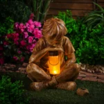 Layhou Lam Glimpses of God Solar Boy with Lantern Statue